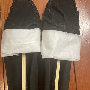 Brand NEW! Black Minnetonka moccasins
